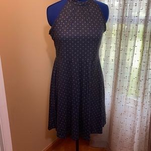 Halter dress in dark blue with subtle pattern.
